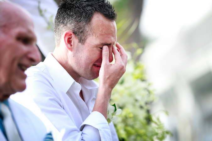The groom crying at the first meet his beautiful bride when walk down the aisle to him at Kata Phuket Beach resort wedding venue